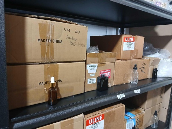 Shelf Lot of Various Size Glass Bottles with Various Caps