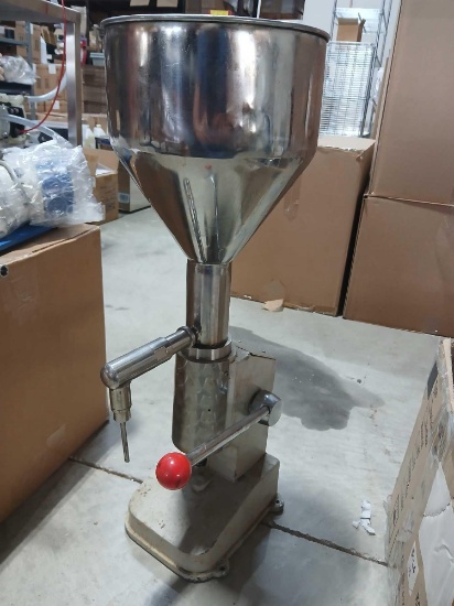 Counter Top Filling Machine. Used