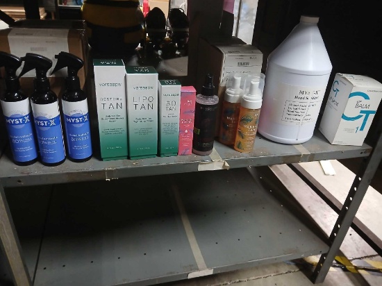Shelf Lot of Sanitizer and Self Tanning Products See Photos