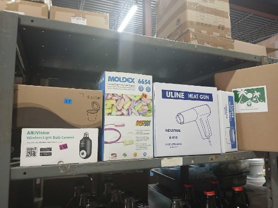 Lot of Lotion Kit. Heat Gun. Ear Plugs. Wireless Camera. See Photos