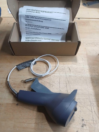Hand Held Clothing Tag Detacher Tool.