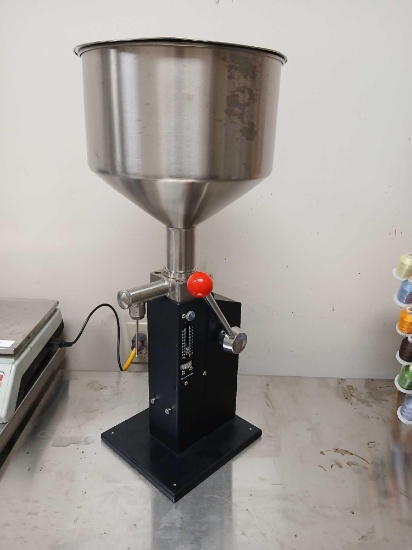 Manual Filling Machine for Liquid or Paste.