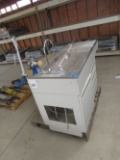 Long s/s sink on 3 drawer rolling cabinet\