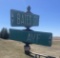 Flandreau, SD Embossed Street Signs w/ Cast Iron Holder (Bates St. & 1st Ave.)