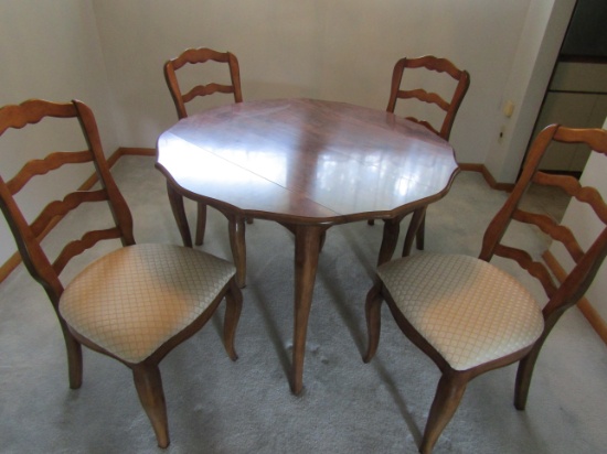 Table with 4 Cushioned Chairs made by Chaircraft