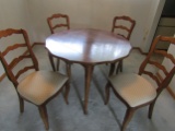 Table with 4 Cushioned Chairs made by Chaircraft