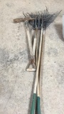 Lot of rakes/fork/pick axe