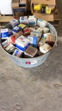 Lot of assorted oil filters in galvanized tub