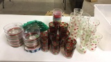 Tub of plastic Christmas glasses/ candy plates/