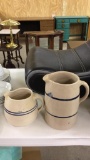 2 clay pitchers