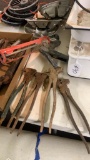 Lot of fence pliers and caulk gun