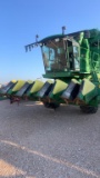 JD. 7455. 4-Row Cotton Stripper