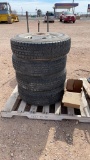 Set of 4 LT235/85R16 tires w/lug nuts & plates