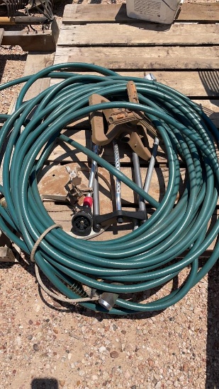 Lot of garden hose/nozzles & sprinklers