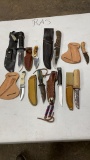Fixed blade knives and sheaths