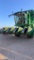 JD. 7455. 4-Row Cotton Stripper