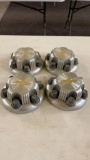 Set of Chevy hub cap covers