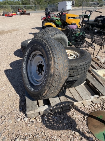 Lot of 4 tires on 8 hole rims