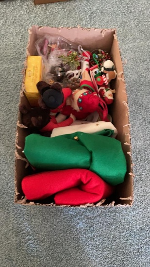 Box of Christmas tree skirts, tablecloth, & o