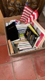 Box of misc books & small U.S. flags
