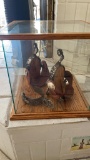 Collectible Scurry Co spurs in glass case