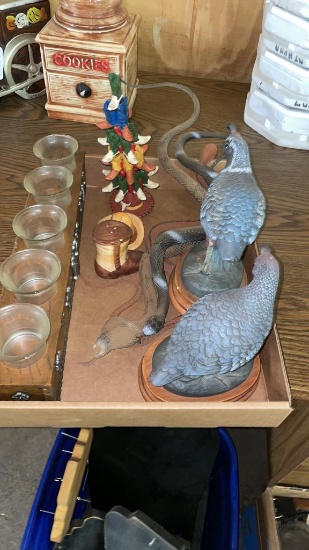 Box of western decor, rubber snakes