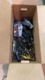 Box of misc electronic cords & remotes