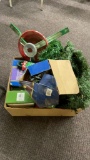 Box of Christmas lights,garland,tree stand & cord