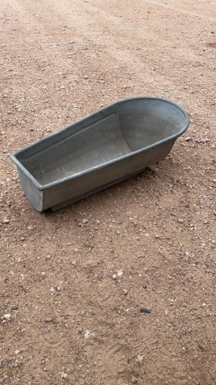 Antique small galvanized bathtub
