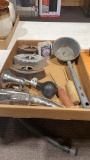 Box of antique irons,can spout,horn, ice picks