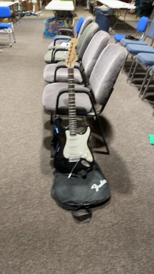 Fender Squier Strat electric guitar and case