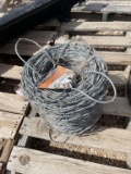 New roll of 12-1/2ga barbed wire