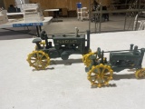 pair of antique Cast Iron toy tractors