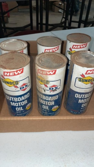 6 cans of outboard motor oil