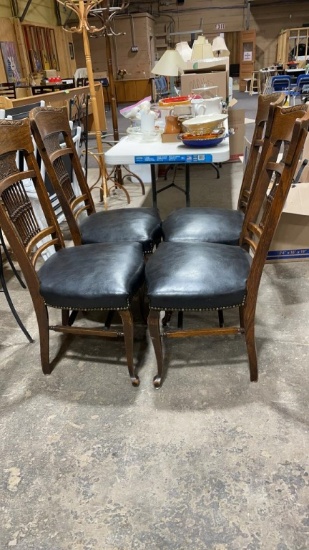 4 leather covered chairs