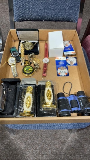 Box of watches,knives,multi tool & hearing aid