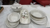 Lot of serving dishes & seasoning shakers