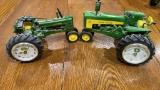 2 John Deere clock tractors