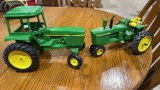 2 John Deere metal tractors