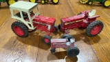 3 International metal tractors