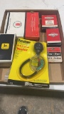 Box of small engine parts