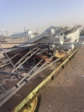 Load of scrap on farm trailer