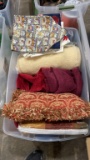 Tub of towels,pillows,tablecloths, runners