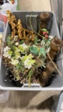 Tub of artificial flowers & wall decor