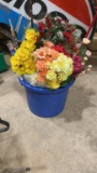 Tub of artificial flowers & flags
