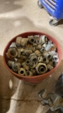 Bucket of conduit fittings