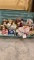 Tub of porcelain dolls
