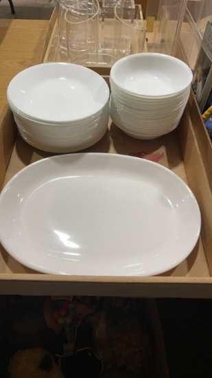Box of white Corelle dishes