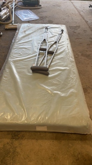 New hospital bed mattress & pair of crutches
