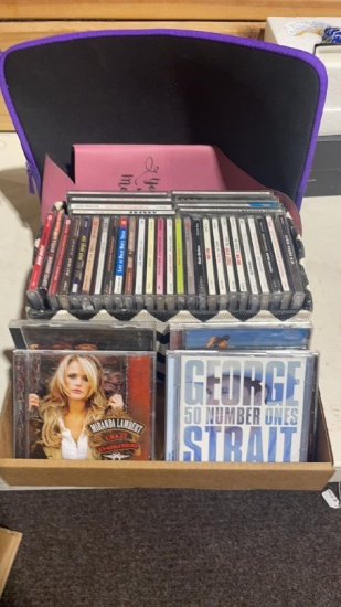 Box of CD’s, wine holder & laptop case